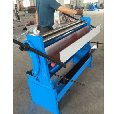 Sheet metal processing machine with folding shearing rolling functions